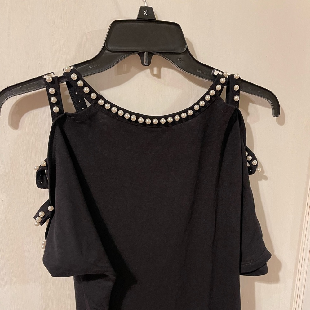 Black and pearl embellished top size Medium.
